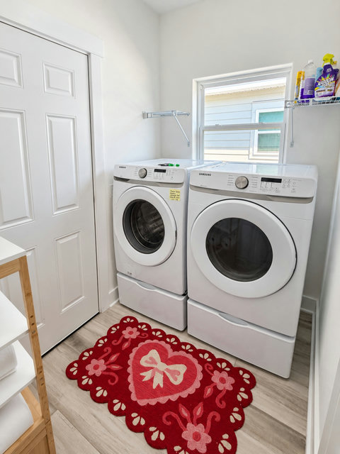 Laundry room with full-size washer and dryer