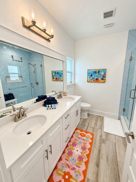 Primary bath with double vanity and glass shower