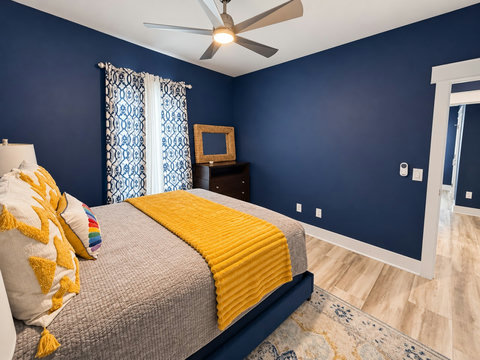 Bedroom 2 with bright coastal accents