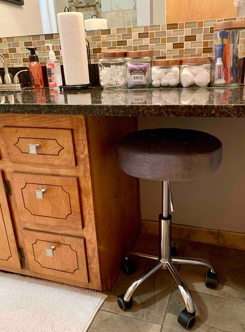 Master bath vanity with adjustable stool