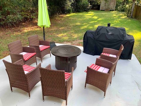 Outdoor living space with fire pit and smoker/grill