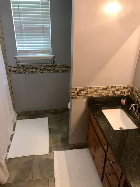 Master bathroom with walk in shower and separate linen closet