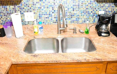 Soap and hand sanitizer on-site in kitchen and bathrooms