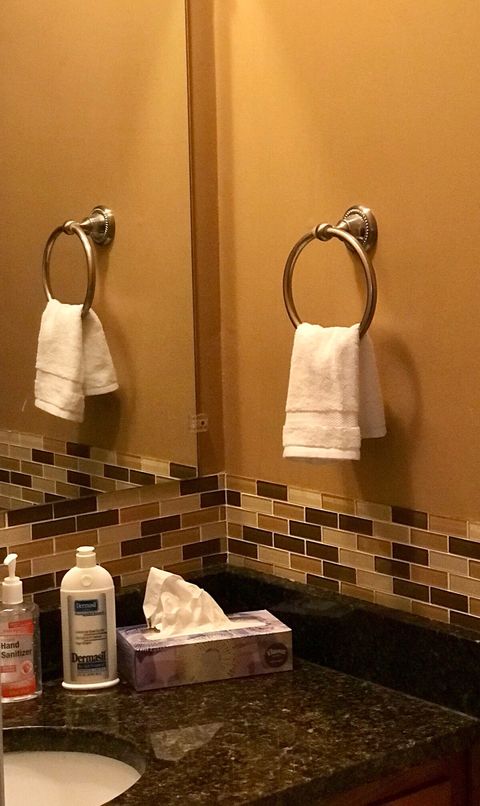 Main bathroom with granite countertop and porcelain sink