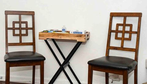 Extra chairs accommodate individual seating for up to 8 in living room and 7 in kitchen