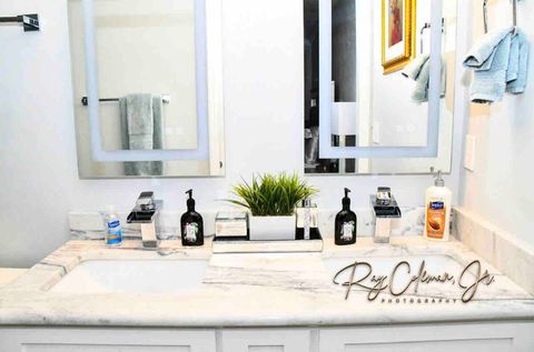 Master bedroom en-suite.  Travel toothbrush and single use over the counter medication are in vanity drawers.