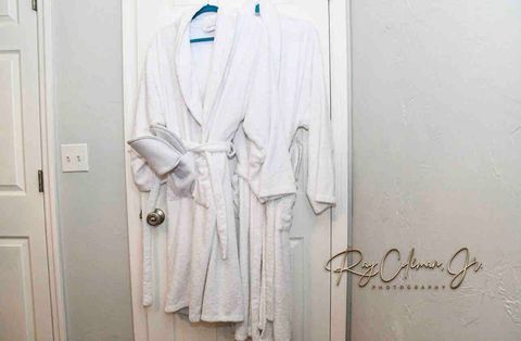 Duel spa bath robes can be found behind each bedroom door