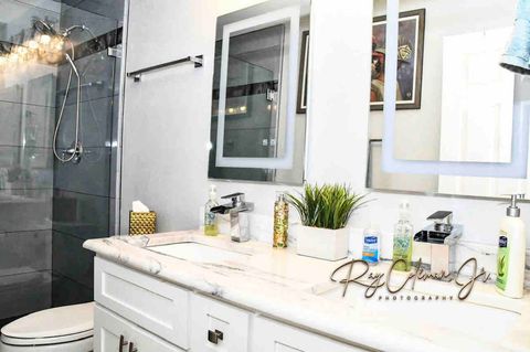 Vanity with double sinks and quartz countertop