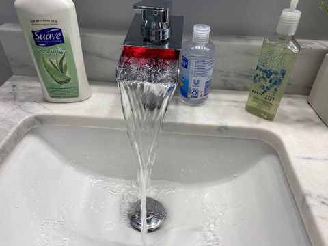 Color coded bathroom faucet water flow

Red -> Hot
Green -> Warm
Blue -> Cold