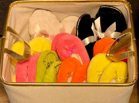 Slipper basket can be found to the left of front door as you walk in.  Please enjoy these house shoes while onsite.   Not to be worn outdoors or taken when you leave.  Washed after each stay.