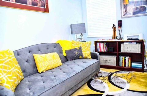 Dedicated office with desk, printer, internet tv and futon.