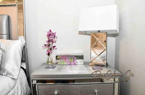 Bedroom suite mirror accents reflected in accompanying accessories