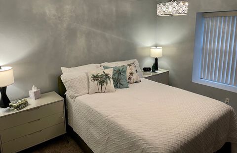 Bedroom 2 with queen bed and smart tv