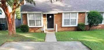 Front entrance with parking spaces (2)