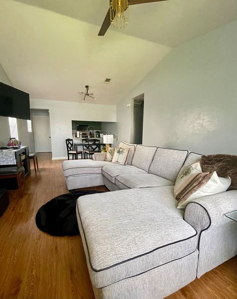 Open concept living area with smart tv