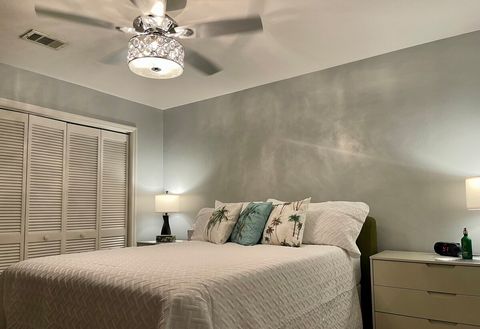 Bedroom 2 with reach in closet and 3 drawer nightstands 