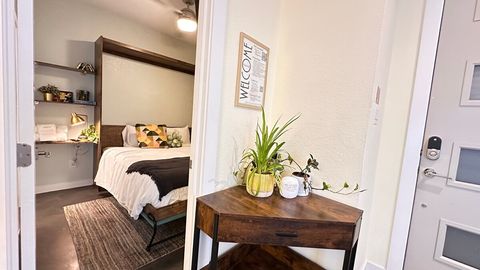 Front door, entryway, 1st floor bedroom.  Keyless access code deadbolt, plenty of exterior and interior lighting, and wall hooks for all your accessories you will need as you walk out the door!