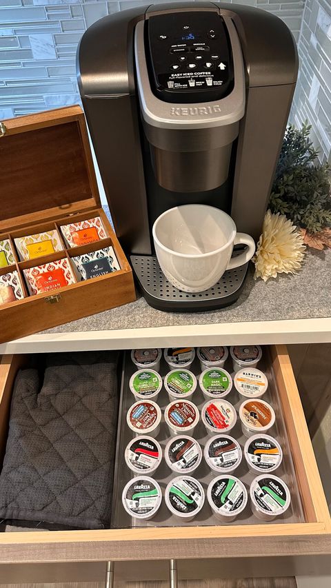 A variety of coffee pods and teas are provided for use with the Keurig coffee machine, tea kettle, or french press.  (Available flavors may not be what is represented in the photo). Also provided are various sizes of mugs to enjoy your cup of “go.”