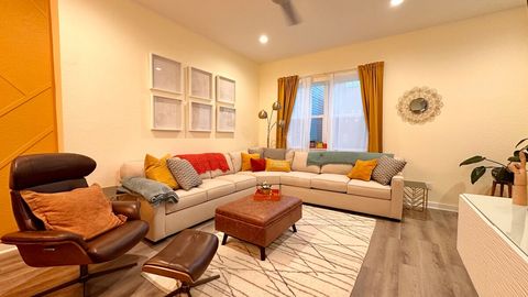 The 2nd floor features the living area with a comfy couch (and a hidden queen sleeper sofa, the dining area, full kitchen and a half bath for convenience!