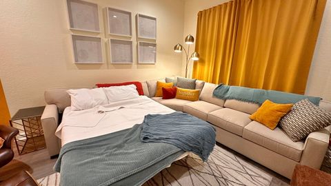 The living room has the most comfortable queen sofa sleeper we could find.  Blankets and pillows can be found in the ottoman and the tv console.  There are additional mattress pads upstairs in the primary bedroom to further improve comfort.