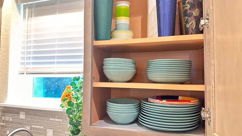 Dishes for adults and children.  A few tall water cups with straws are provided to help keep your group hydrated in the heat, and all within reach of the kitchen sink.  