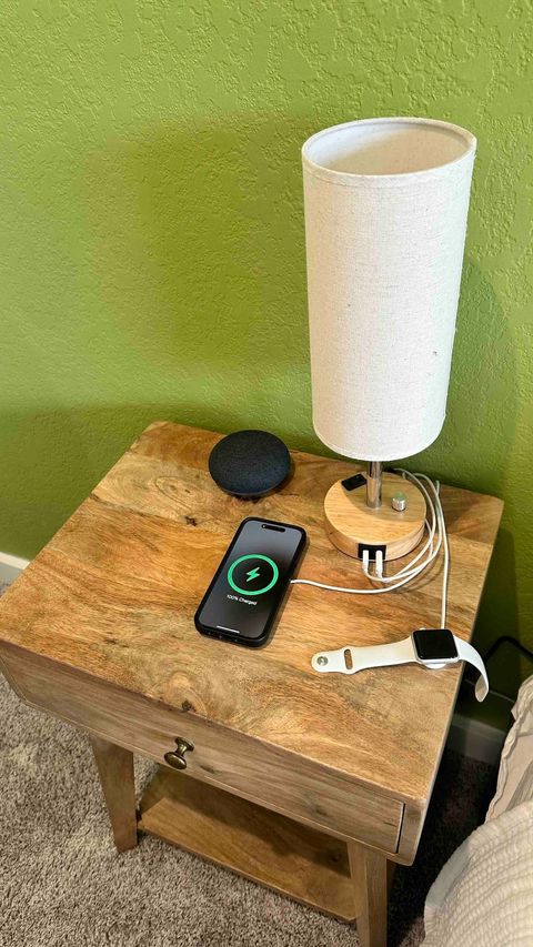 Modern comfort meets convenience: Bedrooms feature Nest Minis and dimmable bedside lamps with USB and USB-C ports, perfect for charging devices while enjoying a cozy ambiance.