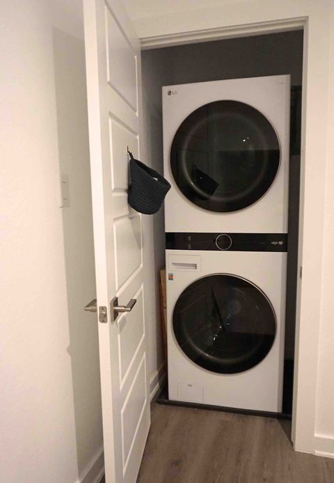 Convenient laundry room on the third floor features a brand new washing machine and dryer in the hallway.  A few hypoallergenic laundry pods and a choice of either dryer sheets or wool dryer balls are included for each stay.  