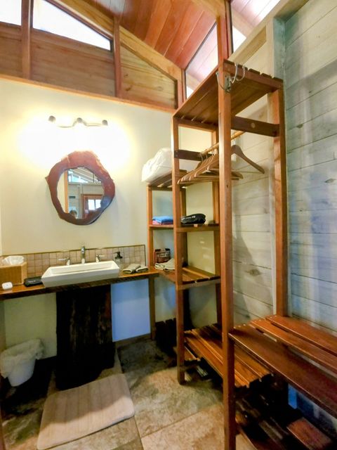 Plenty of storage space for hanging clothes, suitcases and folded clothes.
