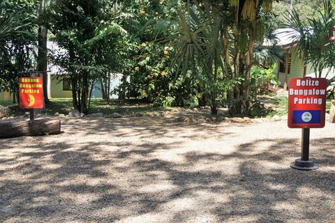 Belize Bungalow parking space on the right.