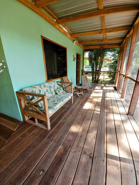 HUGE screened in deck with 4 hammocks, dining table & extra patio seating!