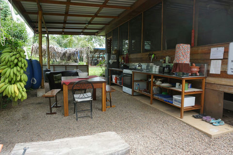 Full outdoor kitchen (shared).  Six burner stove, double sink, full size frig/freezer, coffee grinder, tea kettle, French press and much more!