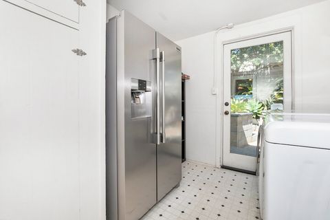 [Kitchen] Large stainless steel fridge is big enough to fit all of your grocery items.  