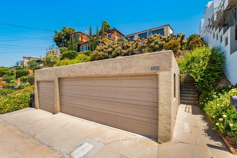 Charming 1920's California style ^ bungalow sitting atop a west-facing hillside. Boast breath-taking views of Coronado and San Diego harbor!
