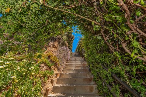 Private entrance with your own private stone staircase will transport you from street level to breath-taking views and sunsets!