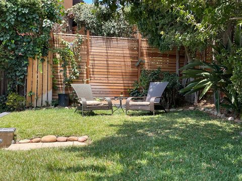 [Backyard] Private fully fenced backyard with outdoor seating to bask in sun and enjoy a drink 