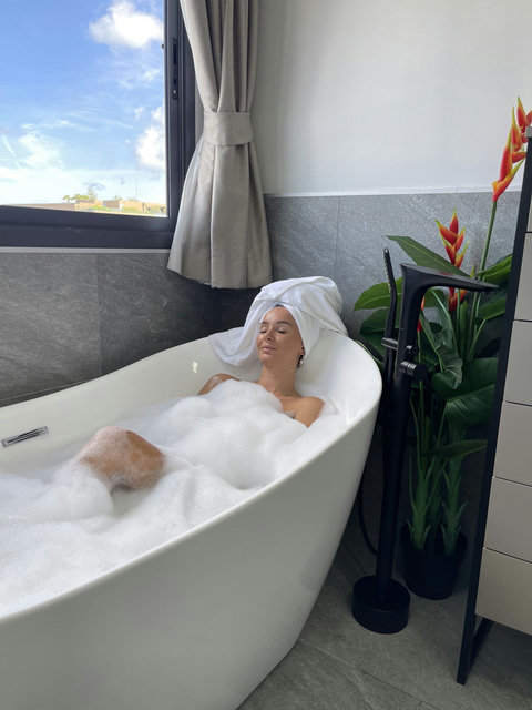 Luxurious freestanding Bathtube in Bathroom 1 - Perfect for a rejuvenating soak after a long day.