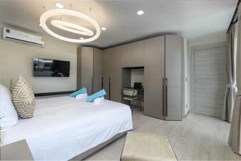 Super comfortable King Bed in Master bedroom 1 with flat screen Smart TV and dedicated working space..