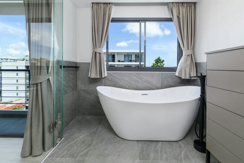 Luxurious freestanding Bathtube in Bathroom 1 - Perfect for a rejuvenating soak after a long day.