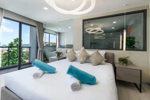 Super comfortable King Bed in Master bedroom 1 with Balcony and ensuite bathroom.