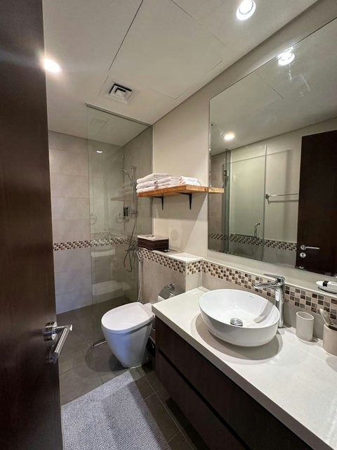 The shower is designed for both children and adults, featuring a modern style, spacious layout, and high-quality showerhead for a comfortable and functional experience.
