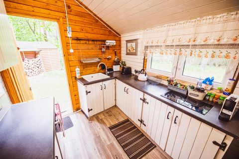 Kitchen with access to wood and back entrance