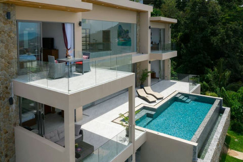 "Villa from the Side: Another drone shot revealing the villa's majestic stance."