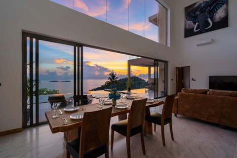 "Breakfast with a View: Start your day with breathtaking sunrise views, right from the living room table."