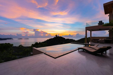 "Golden Mornings: Wake up to the stunning hues of sunrise from Villa Majesta's terrace."