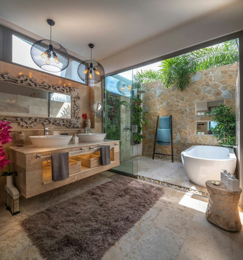 Relax and unwind in our outdoor hot tub, surrounded by open skies and the gentle sounds of nature."