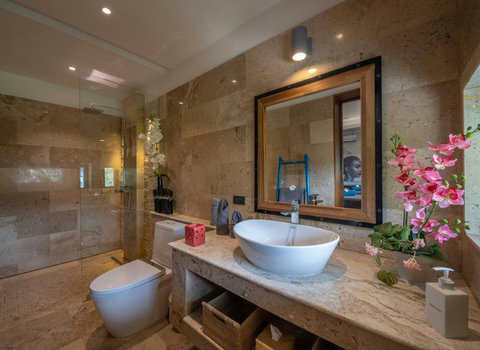 Refresh and rejuvenate in our stylish bathroom, where comfort meets contemporary design."