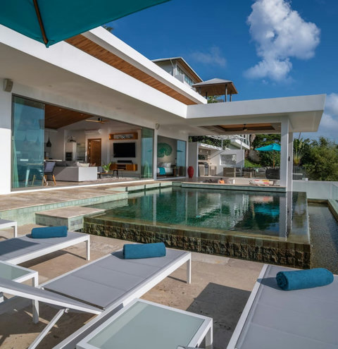 - "Bask in the sun or enjoy a quiet evening on our comfortable sunbeds, right on the pool terrace with the ocean in the background."