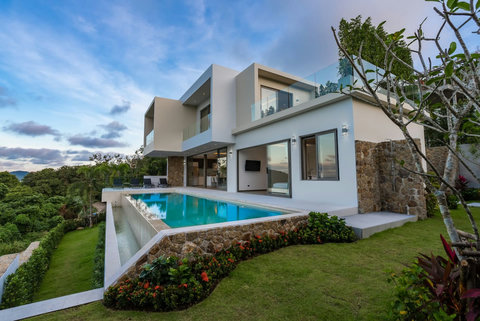 "Tranquil garden oasis with a pool to refresh and rejuvenate."
