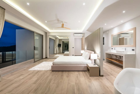 "Luxury suite with a hot tub and shower—ultimate relaxation awaits."