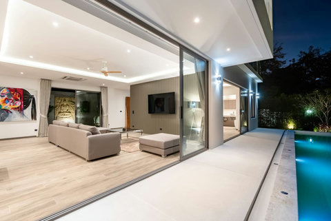 "Living room vibes by night—where comfort meets chic elegance."